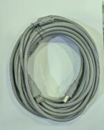 Coiled grey USB cable on surface